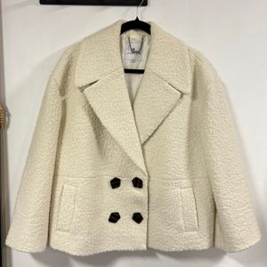 casaco le lis blanc 125864203?action_source=70657&ref=home_home&rsp=1&rspix=1