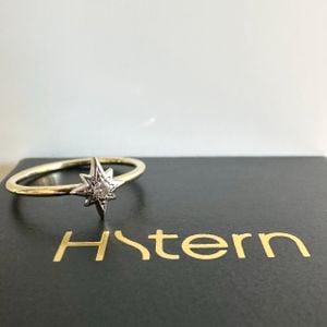 anel hstern estrela ouro amarelo ouro branco e diamante 131831048?action_source=69863&ref=home_home&rsp=1&rspix=1
