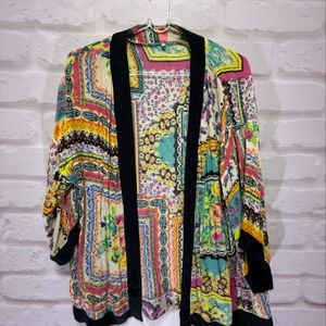 blusa manga longa farm 125239411?action_source=67222&ref=home_home&rsp=1&rspix=1