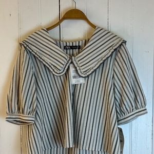 blusa zara listrada gola maxi 150659582?action_source=76858&ref=home_home&rsp=1&rspix=1