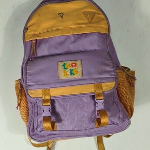 mochila luluca roxo claro laranja 132850058?action_source=66794&ref=home_home&rsp=1&rspix=1