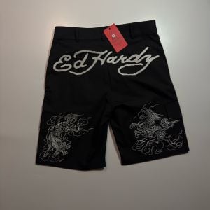 shorts ed hardy x matue preto 142062877?action_source=72140&ref=home_home&rsp=1&rspix=1