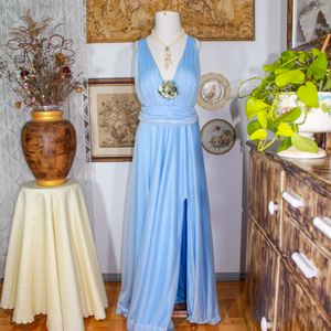vestido longo de festa malha lurex com fenda lateral e decote 148221310?action_source=74549&ref=home_home&rsp=1&rspix=1