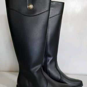 bota lumiss cano alto preta 34 140374125?action_source=70522&ref=home_home&rsp=1&rspix=1