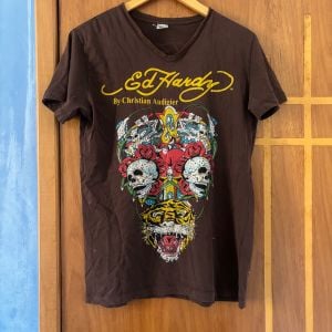 camiseta ed hardy marrom 142765387?action_source=72140&ref=home_home&rsp=1&rspix=1