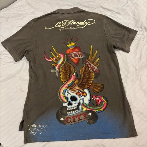camisa polo ed hardy masculina m 138763319?action_source=72701&ref=home_home&rsp=1&rspix=1