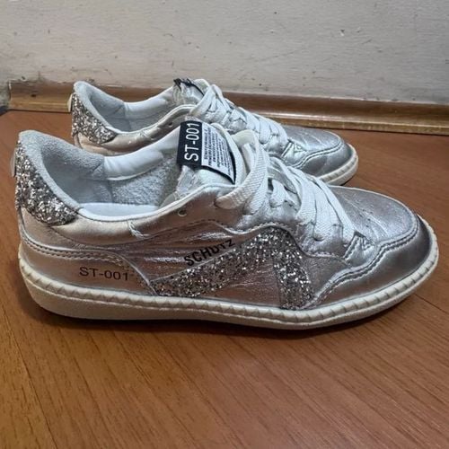 tenis schutz st 001 prata 34 147429520?action_source=31946&ref=home_home&rsp=1&rspix=1