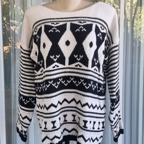 blusa de tricot anselmi off white e preta 141425994?action_source=31319&ref=home_home&rsp=1&rspix=1
