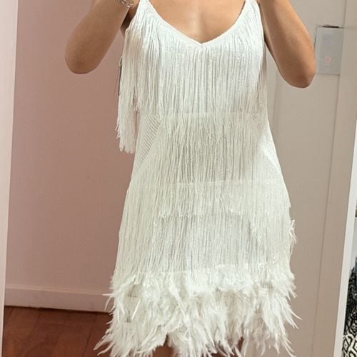vestido branco franjas paetes plumas 138328666?action_source=31319&ref=home_home&rsp=1&rspix=1