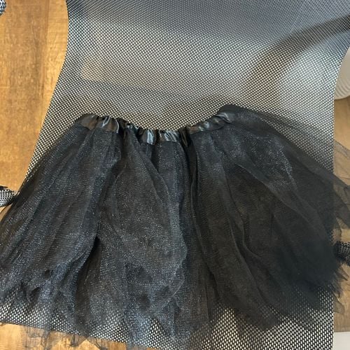 saia tutu preta brilhante 134149412?action_source=67456&ref=home_home&rsp=1&rspix=1