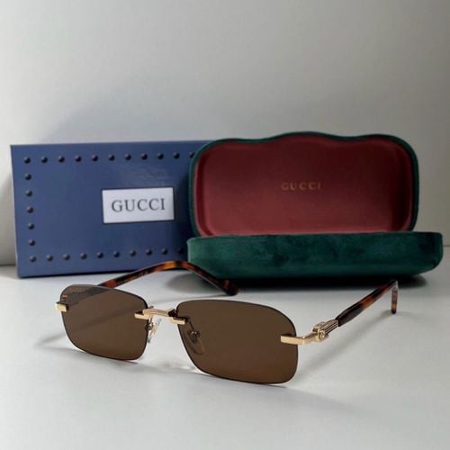 oculos de sol gucci marrom 143316223?action_source=72470&ref=home_home&rsp=1&rspix=1