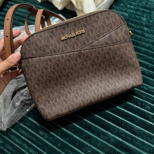 bolsa michael kors marrom monograma 147638907?action_source=72767&ref=home_home&rsp=1&rspix=1