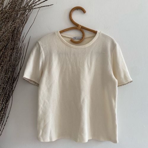 blusa zara manga curta off white 149626418?action_source=75772&ref=home_home&rsp=1&rspix=1