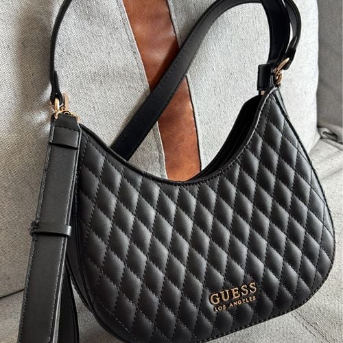 bolsa preta com alca de mao e longa marca guess nova 128924134?action_source=70655&ref=home_home&rsp=1&rspix=1