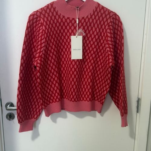 blusa de tricot shoulder geometrica pp 147788874?action_source=75013&ref=home_home&rsp=1&rspix=1
