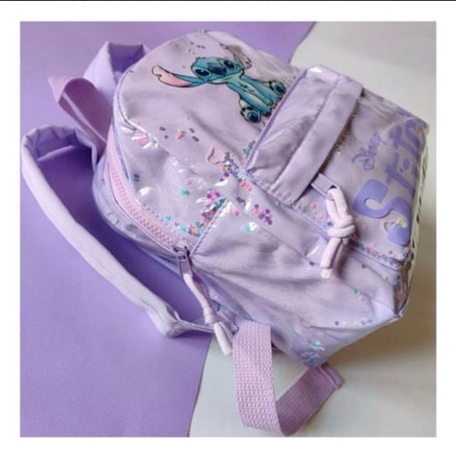 mochila do stitch 131315423?action_source=66794&ref=home_home&rsp=1&rspix=1