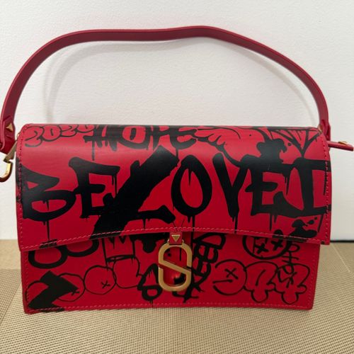 bolsa schutz grafite vermelha 145718542?action_source=67222&ref=home_home&rsp=1&rspix=1