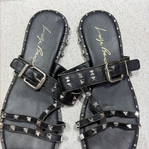 rasteira luiza barcelos spikes preta 153532877?action_source=77487&ref=home_home&rsp=1&rspix=1