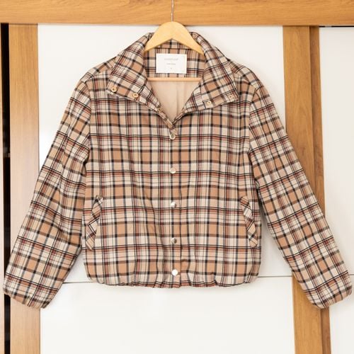 missinclof e riachuelo jaqueta bomber xadrez marrom caramelo 143273729?action_source=72470&ref=home_home&rsp=1&rspix=1