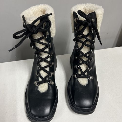 coturno carrano preto com pelos 140673300?action_source=70522&ref=home_home&rsp=1&rspix=1