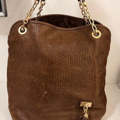 bolsa louis vuitton original souple whisper gm marrom 150786558?action_source=72470&ref=home_home&rsp=1&rspix=1