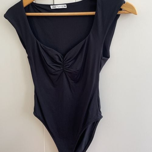 body zara preto p 150106282?action_source=76596&ref=home_home&rsp=1&rspix=1