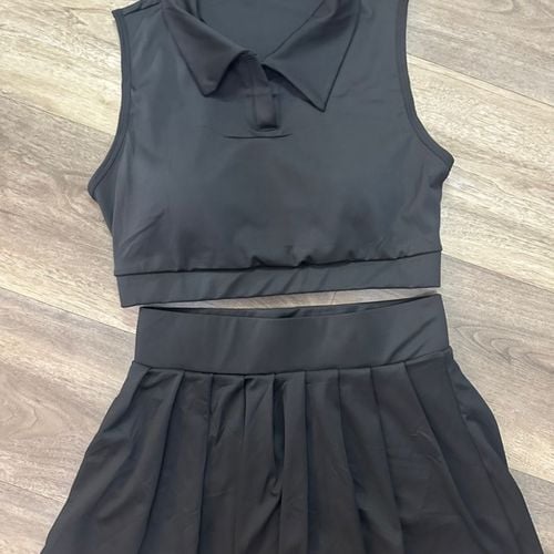 conjunto feminino short saia e top preto p 148423976?action_source=74549&ref=home_home&rsp=1&rspix=1