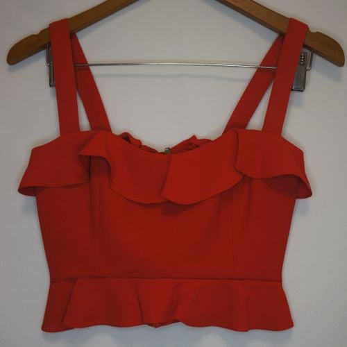 top cropped vermelho estruturado com babados 125224522?action_source=63594&ref=home_home&rsp=1&rspix=1