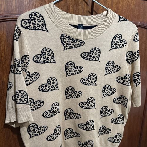 blusa de trico renner estampa coracao bege 141652316?action_source=31319&ref=home_home&rsp=1&rspix=1