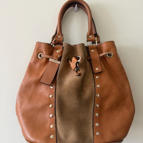 bolsa de mao arezzo bege couro 140204070?action_source=76035&ref=home_home&rsp=1&rspix=1