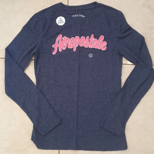 blusinha aeropostale manga longa 103074628?action_source=70688&ref=home_home&rsp=1&rspix=1