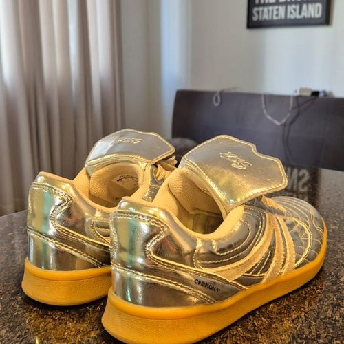 tenis stunt prata inspirado chuteira 121896884?action_source=69599&ref=home_home&rsp=1&rspix=1