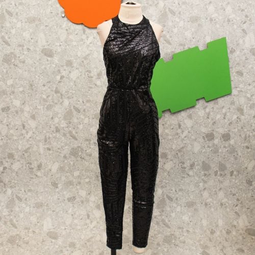 macacao preto paete 134964372?action_source=67421&ref=home_home&rsp=1&rspix=1