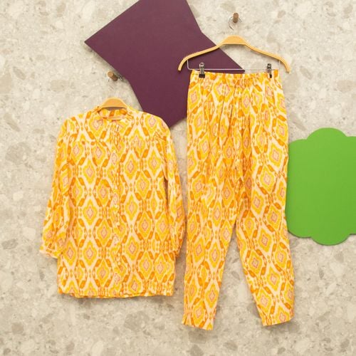 conjunto ikat camisa e calca laranja estampado isabella giobbi 111285146?action_source=70489&ref=home_home&rsp=1&rspix=1