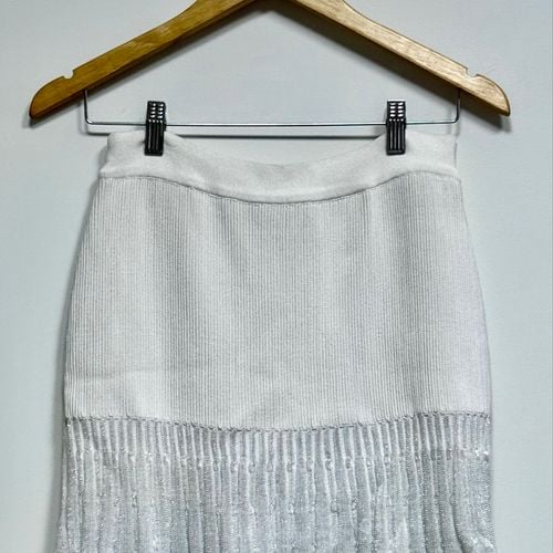 saia em trico le lis blanc 119780480?action_source=70657&ref=home_home&rsp=1&rspix=1