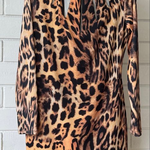 lindo vestido tubinho animal print usado da lanca perfume 133354140?action_source=66695&ref=home_home&rsp=1&rspix=1