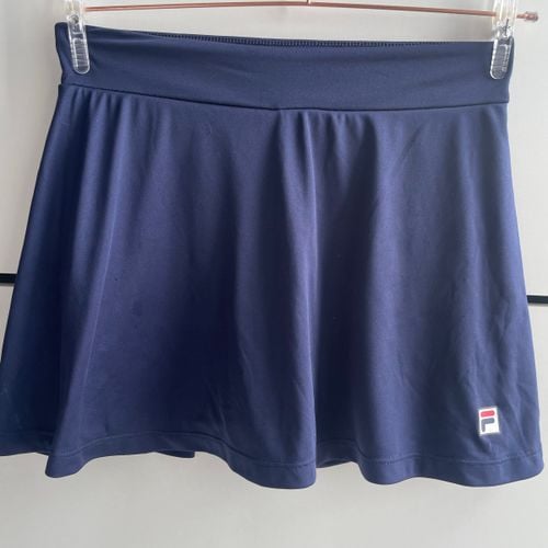 short saia fila azul tamanho p confortavel esportivo e com shorts interno 132778251?action_source=66827&ref=home_home&rsp=1&rspix=1