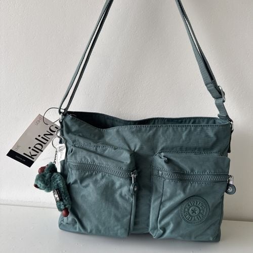 bolsa kipling verde transversal importada dos estados unidos com tag modelo kia1n3 nova 145479616?action_source=64648&ref=home_home&rsp=1&rspix=1