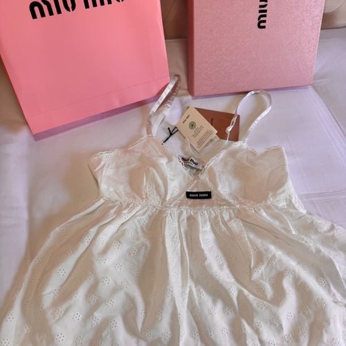 miu miu blusa de popeline com ilhos tam m 38 148409115?action_source=67222&ref=home_home&rsp=1&rspix=1