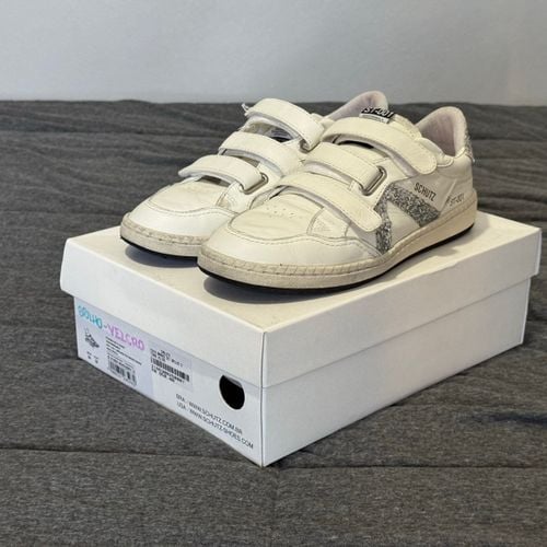 tenis schutz branco velcro 137783472?action_source=68872&ref=home_home&rsp=1&rspix=1