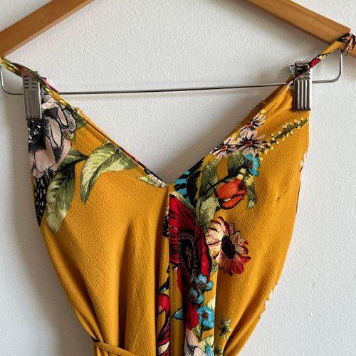 vestido midi mostarda floral 134629058?action_source=64649&ref=home_home&rsp=1&rspix=1