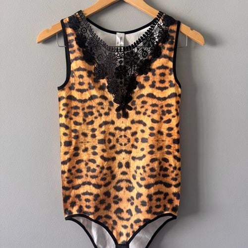 body feminino de oncinha tamanho m carnaval 134302585?action_source=67456&ref=home_home&rsp=1&rspix=1