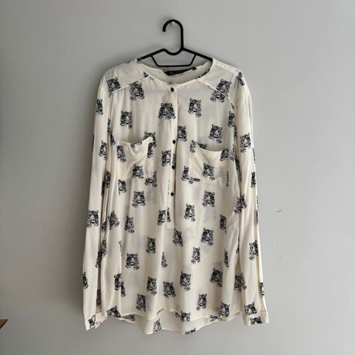 blusa zara trafaluc g estampa de tigre 148871634?action_source=67222&ref=home_home&rsp=1&rspix=1