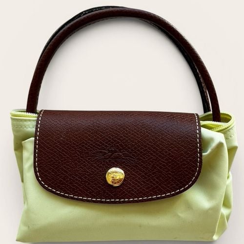 bolsa longchamp le pliage original amarela 145214505?action_source=67222&ref=home_home&rsp=1&rspix=1