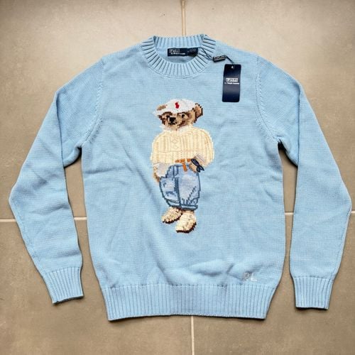 sueter polo ralph lauren bear feminino m 151383195?action_source=75473&ref=home_home&rsp=1&rspix=1