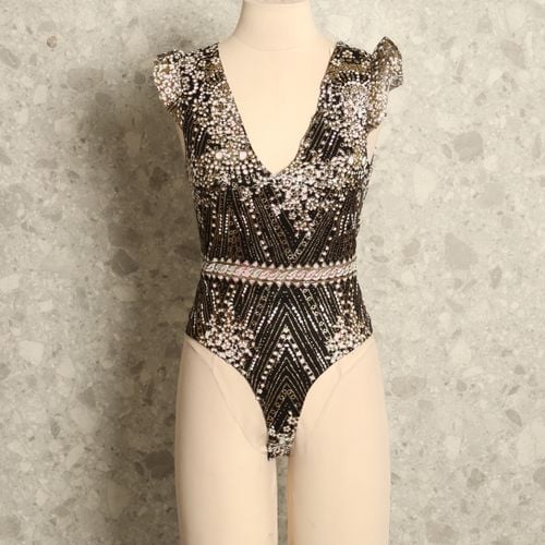 body preto e douradon top charme 136621301?action_source=70096&ref=home_home&rsp=1&rspix=1