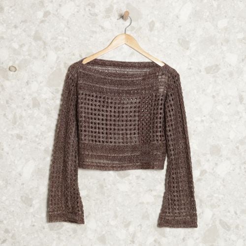 casaco trico marrom 137038225?action_source=69004&ref=home_home&rsp=1&rspix=1