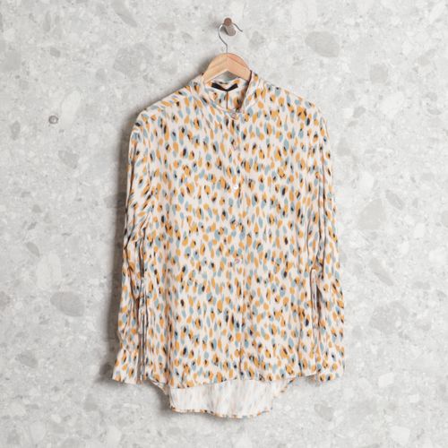 blusa creme animale 123571201?action_source=61447&ref=home_home&rsp=1&rspix=1
