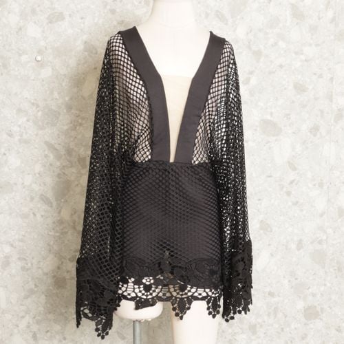 vestido preto 142249999?action_source=67322&ref=home_home&rsp=1&rspix=1