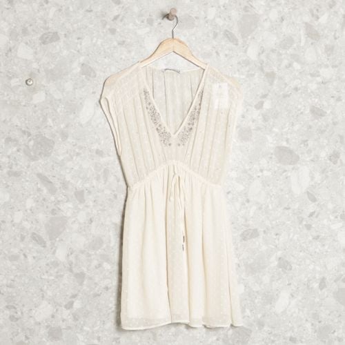 vestido creme zara 126589435?action_source=70754&ref=home_home&rsp=1&rspix=1